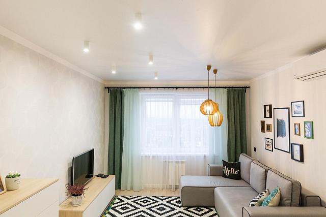 гостиная с угловым диваном и тв